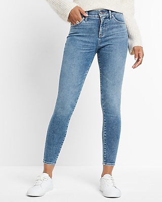Mid Rise Medium Wash Back Zipper Hem Skinny Jeans
