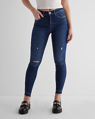 Mid Rise Dark Wash Raw Drop Hem Skinny Jeans