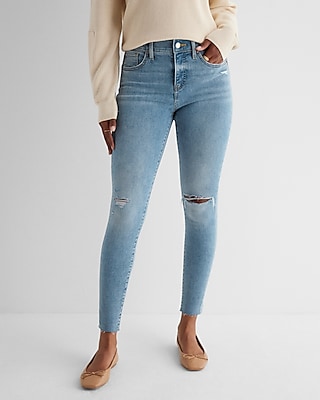 Mid Rise Light Wash Ripped Raw Hem Skinny Jeans