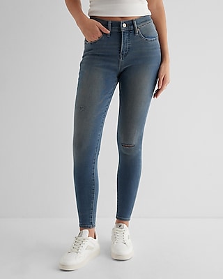 Mid Rise Medium Wash Ripped Skinny Jeans