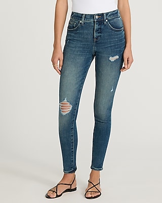 Mid Rise Medium Wash Ripped Skinny Jeans