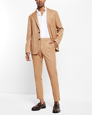 tan suit jacket black pants