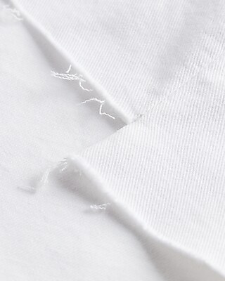 Mid Rise White Covered Button Fly Ripped Boyfriend Jean Shorts