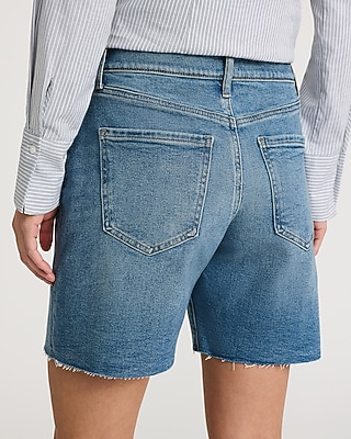 Mid Rise Medium Wash Raw Hem 7" Inseam Loose Jean Shorts