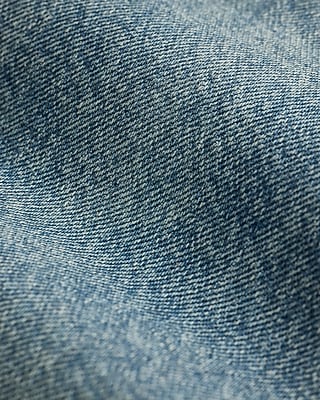 Mid Rise Light Wash Barrel Jeans