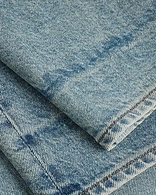 Mid Rise Light Wash Barrel Jeans