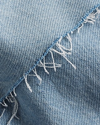 High Waisted Light Wash Two-Tone Criss Cross Raw Hem Wide Leg Jeans