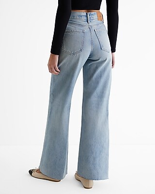 High Waisted Light Wash Raw Hem Ripped Sides Wide Leg Jeans
