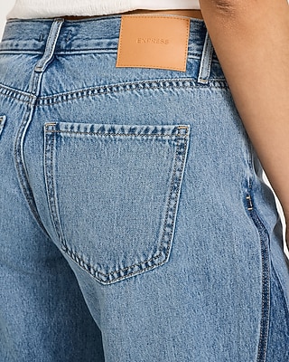 High Waisted Light Wash Released Hem Relaxed Wide Leg Jeans