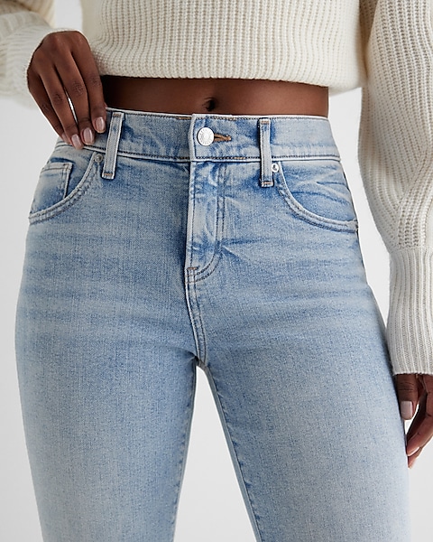 Mid Rise Light Wash Front Vent '70s Flare Jeans