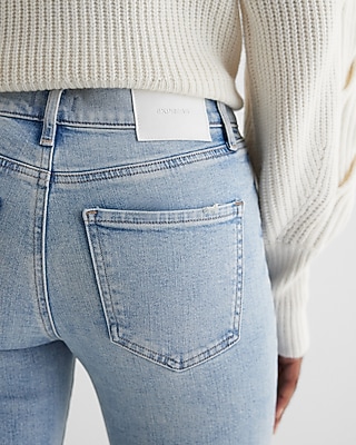 Mid Rise Light Wash Front Vent '70s Flare Jeans