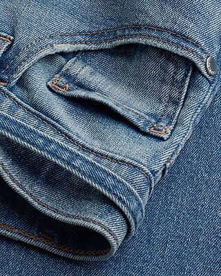 Mid Rise Medium Wash Belted '70s Flare Jeans