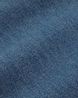 Mid Rise Medium Wash Belted '70s Flare Jeans