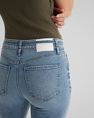 Mid Rise Medium Wash Belted '70s Flare Jeans