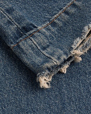 Mid Rise Medium Wash Raw Hem '70s Flare Jeans