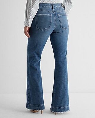 Mid Rise Medium Wash Raw Hem '70s Flare Jeans