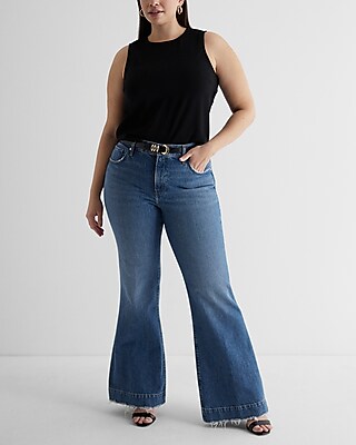 Mid Rise Medium Wash Raw Hem '70s Flare Jeans