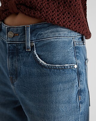 Mid Rise Medium Wash Raw Hem '70s Flare Jeans