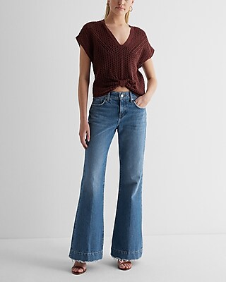 Mid Rise Medium Wash Raw Hem '70s Flare Jeans