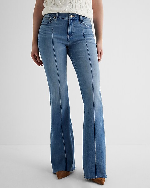 Mid Rise Medium Wash Pintuck Raw Hem Flexx '70s Flare Jeans