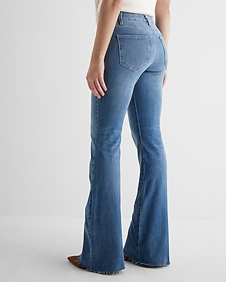 Mid Rise Medium Wash Pintuck Raw Hem FlexX '70s Flare Jeans