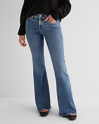 woman wearing blue flared jeans