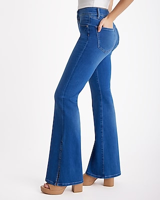 Mid Rise Dark Wash Raw Hem Flexx '70s Flare Jeans | Express