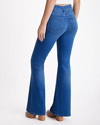 Mid Rise Medium Wash Slit Hem '70s Flare Jeans