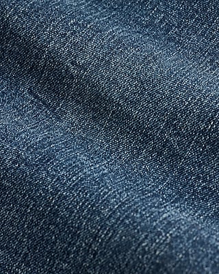 High Waisted Medium Wash Raw Hem FlexX '70s Flare Jeans
