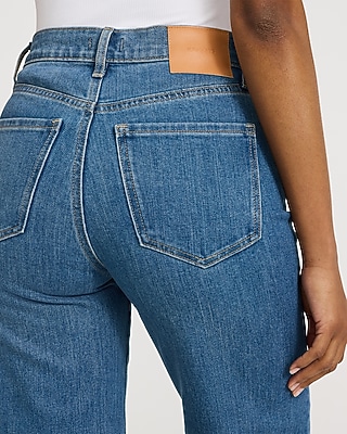 High Waisted Medium Wash Front Seam Raw Hem Relaxed Flare Jeans