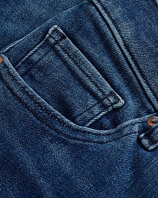 Mid Rise Medium Wash Button Fly Skinny Jeans