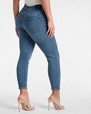 Mid Rise Medium Wash Button Fly Skinny Jeans