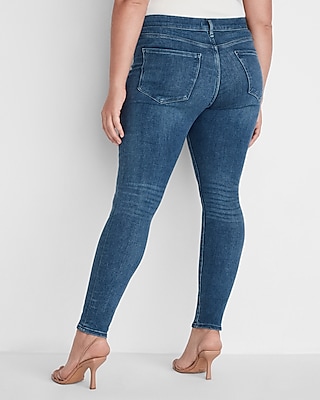 Mid Rise Medium Wash Button Fly Skinny Jeans