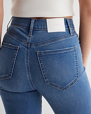High Waisted Medium Wash Ripped Raw Hem Skinny Jeans
