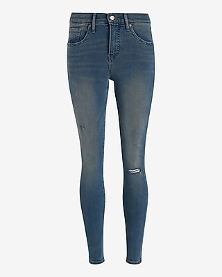 Mid Rise Medium Wash Ripped Skinny Jeans