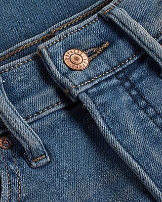 Mid Rise Medium Wash Ripped Skinny Jeans