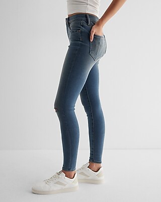 Mid Rise Medium Wash Ripped Skinny Jeans - image 3