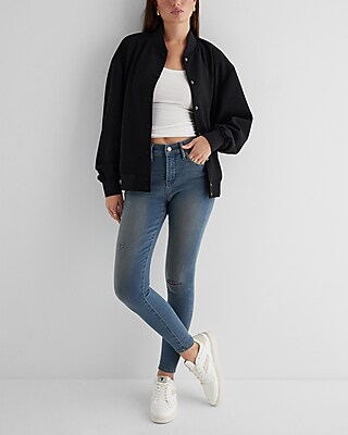 Mid Rise Medium Wash Ripped Skinny Jeans