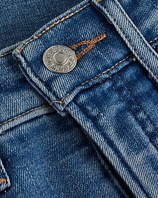 High Waisted Medium Wash Ripped Raw Drop Hem Skinny Jeans