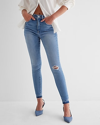 High Waisted Medium Wash Ripped Raw Drop Hem Skinny Jeans