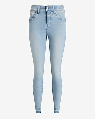 Mid Rise Light Wash Raw Drop Hem Skinny Jeans