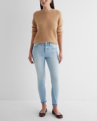 Mid Rise Light Wash Raw Drop Hem Skinny Jeans