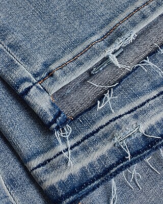Mid Rise Light Wash Ripped Raw Hem Cropped Skinny Jeans