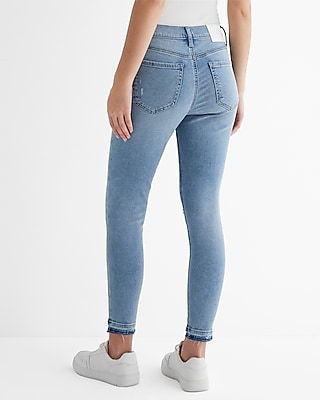 Mid Rise Light Wash Ripped Raw Hem Cropped Skinny Jeans - image 3
