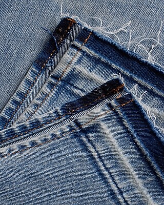 Mid Rise Light Wash Drop Hem FlexX Skyscraper Jeans