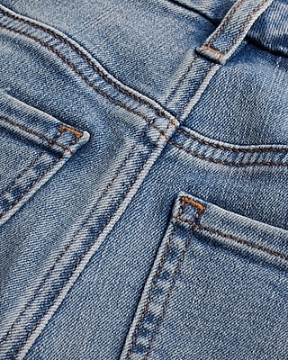 Mid Rise Light Wash Drop Hem FlexX Skyscraper Jeans