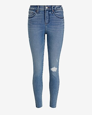 Mid Rise Medium Wash Ripped Raw Hem Skinny Jeans