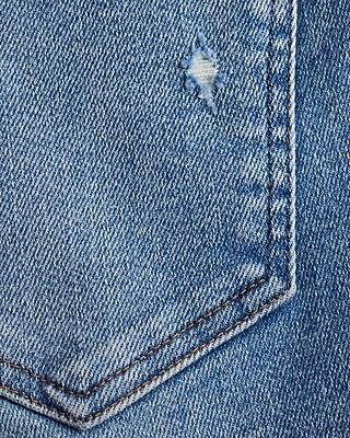 Mid Rise Medium Wash Ripped Raw Hem Skinny Jeans