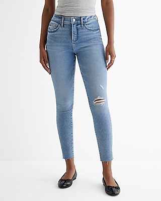 Mid Rise Medium Wash Ripped Raw Hem Skinny Jeans