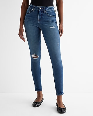 Mid Rise Medium Wash Ripped Skinny Jeans